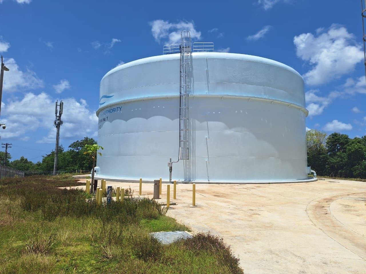Astumbo water tank after repair, now coated in light blue