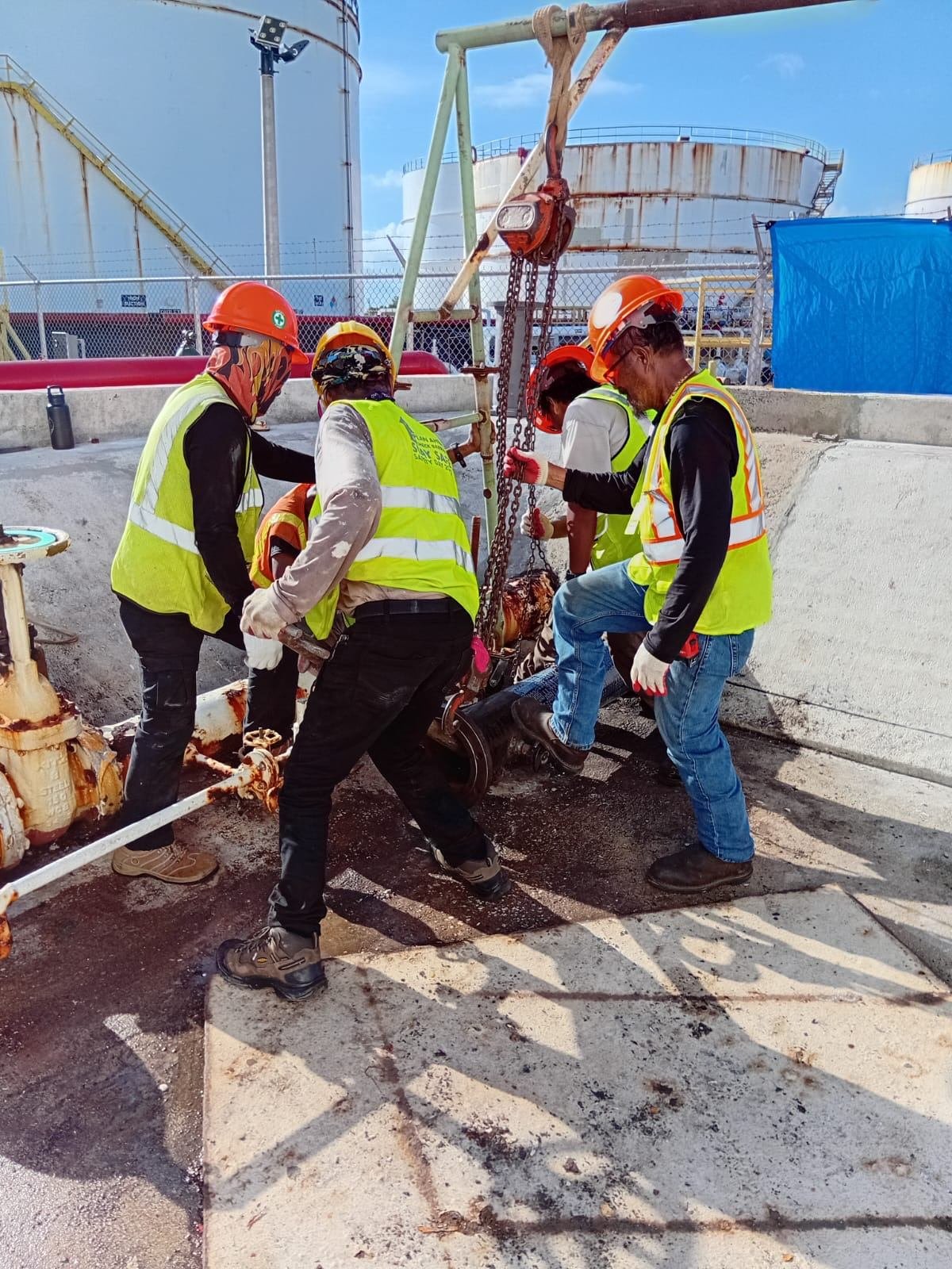 RDE crew working together on a valve assembly