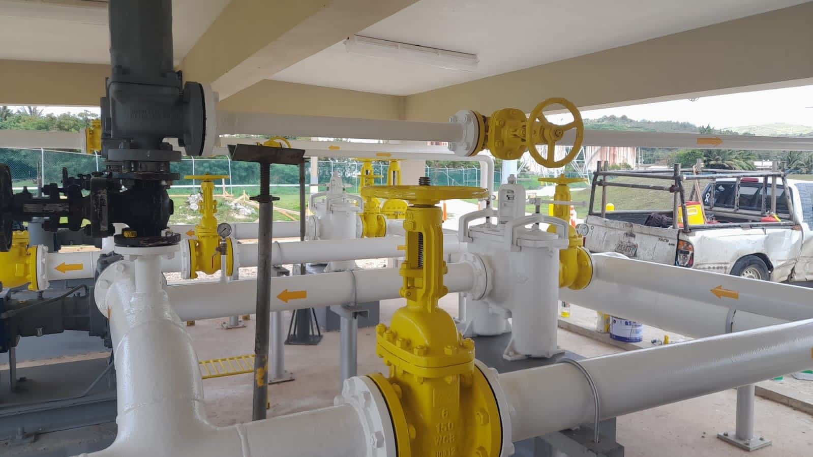 ULSD pump house with white and yellow process piping and valves
