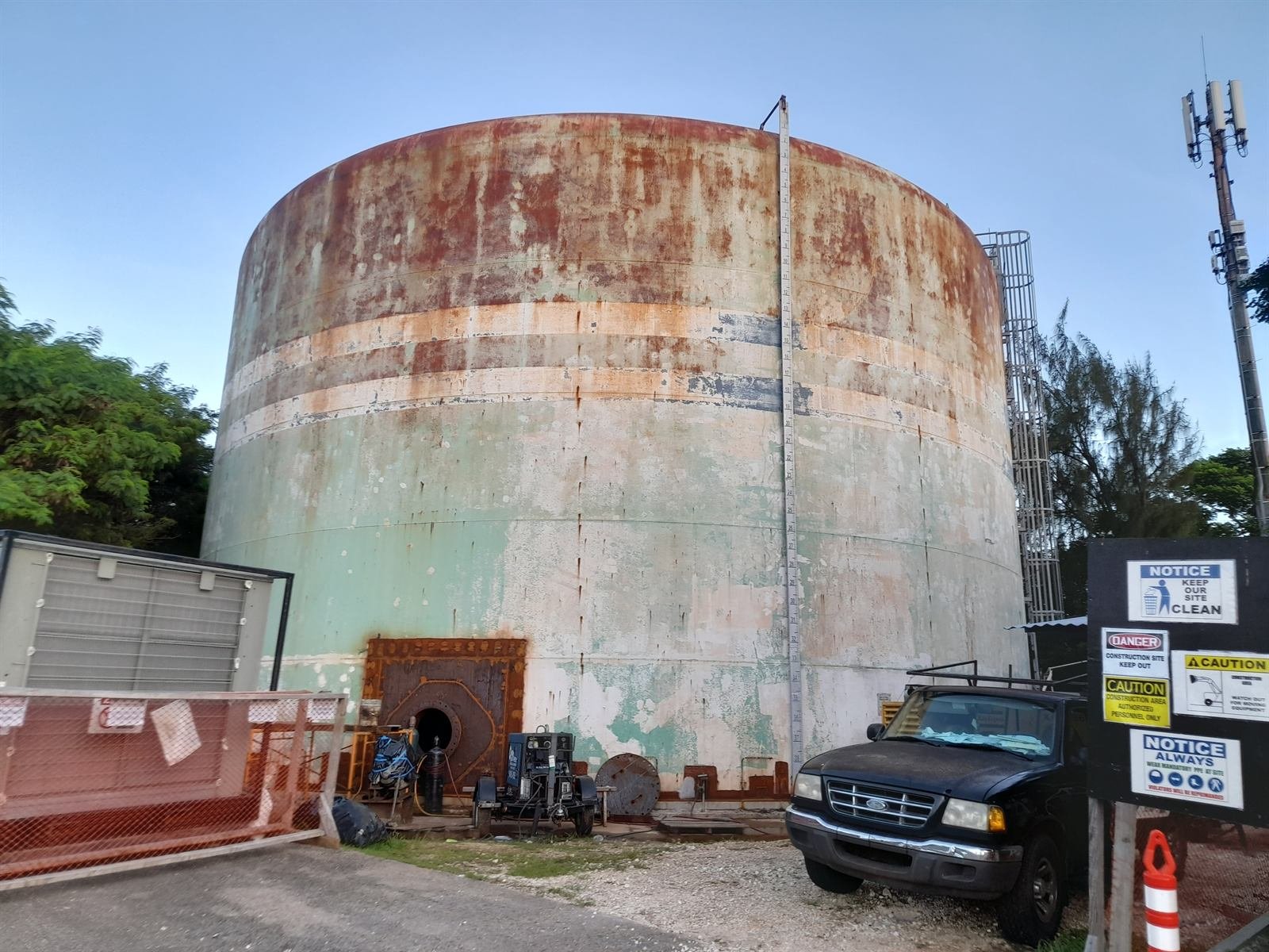 Windward Hills tank before repair, rusted and stained